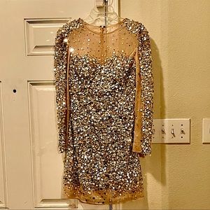 This dress is a size 6. If you wear a size 29 30 in jeans you’ll fit perfect